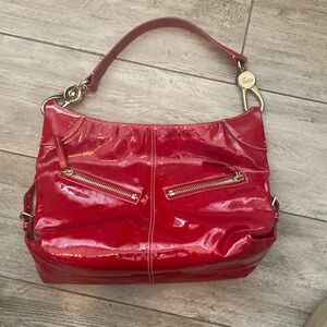 Dooney and Bourke red patent leather shoulder purse/hobo 17x6.5x11.5" AAA